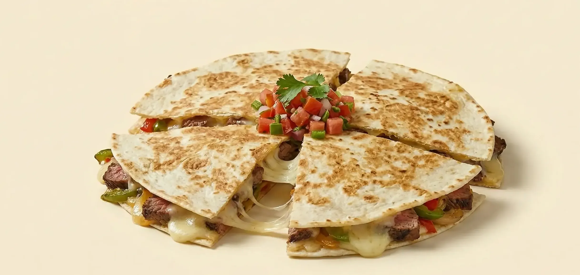 Chipotle-inspired quesadilla cutout on a warm neutral background